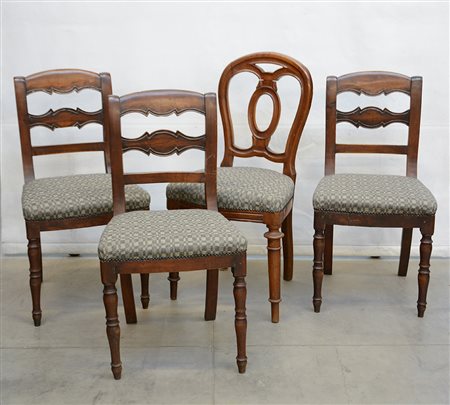 Lotto composto da quattro sedie con seduta rivestita in tessuto. Una di forma...