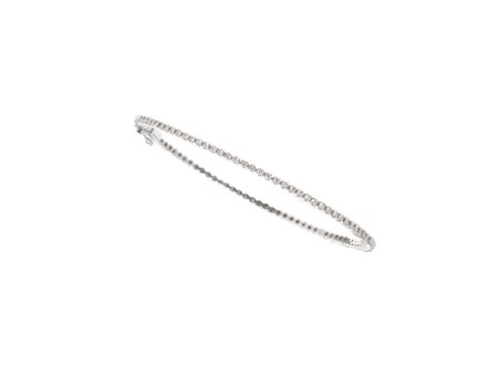 BRACCIALE IN ORO BIANCO E DIAMANTI montatura a cerchio rigido in oro sagomato...