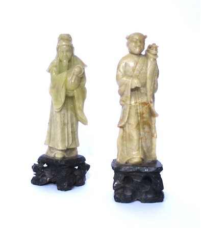 GIADAITE, Due sculture in giadaite raff. "Santoni" - h 12 cm - Cina XX sec
