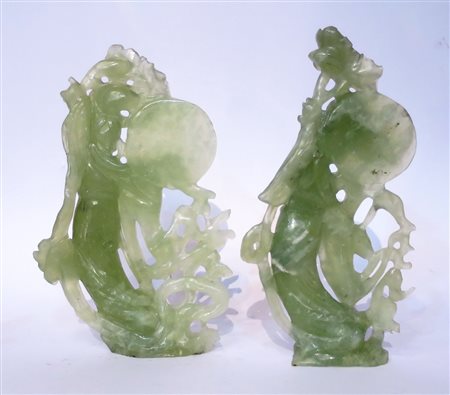 GIADAITE, Coppia di sculture in giadaite - guainin - h 24 cm - Cina XX sec.