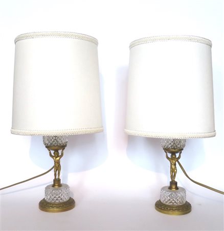 LAMPADE, Coppia di lampade in cristallo con decori in bronzo dorato con putto...