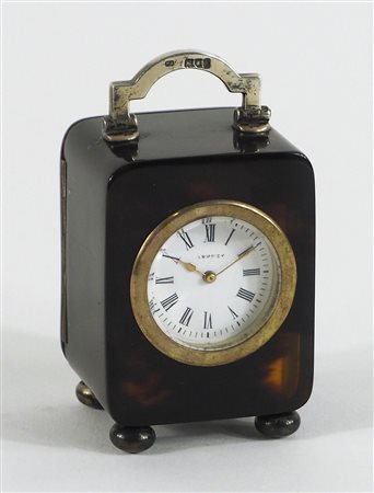 Orologio sveglia da tavolo in tartaruga e argento con quadrante centrale a...