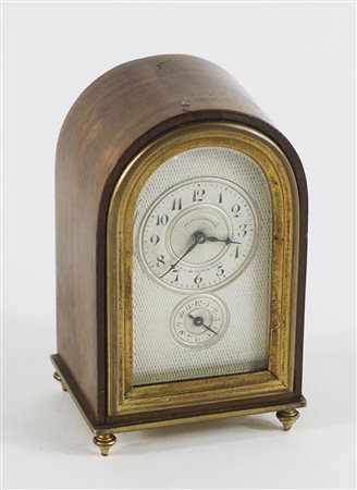 Orologio da tavolo a lunetta in legno e ottone. H. cm. 10.