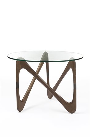 Tavolino con gambe in teak massello e ottone, con piano circolare in vetro....