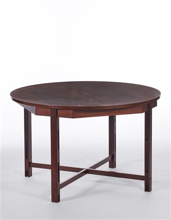 Tavolo con piano circolare allungabile in teak massello e impiallacciato....