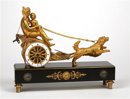 MANIFATTURA FRANCESE DEL PERIODO DELL'IMPERO Orologio da tavolo, carro di...