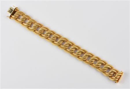BRACCIALE IN ORO GIALLO realizzato ad una linea di maglie doppie in oro...