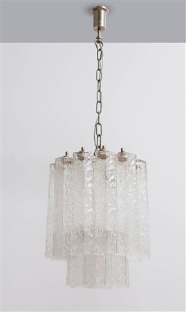 Lampadario con elementi in vetro, Produzione Muranese, Anni ‘70. Struttura...