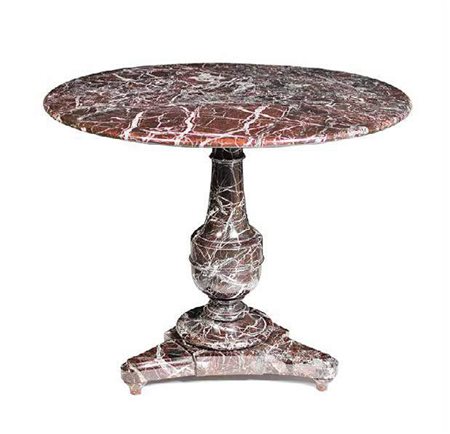 TAVOLO IN MARMO ROSSO INIZI DEL XIX SECOLO con piano circolare sorretto da un...
