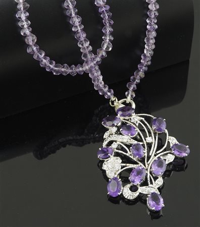 Collana di ametisti con pendete in argento rodiato e 11 ametisti.