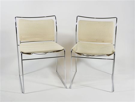 Sala da pranzo composta da tavolo in cristallo su base cromata a libro e 8...