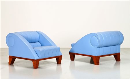 LEON KRIER Coppia poltrone. -. Cm 82,00 x 71,00 x 99,00. Legno di ciliegio e...