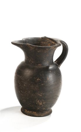 OINOCHOE IN BUCCHERO Tipo Rasmussen 1979, 3a DATAZIONE: VI sec. a. C. MATERIA...