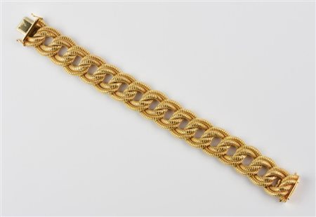 BRACCIALE IN ORO GIALLO realizzato ad una linea di maglie doppie in oro...