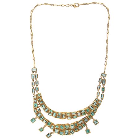 Collana in oro giallo 18kt Maglia a ovali ritorti, con centrale a bavaglino...