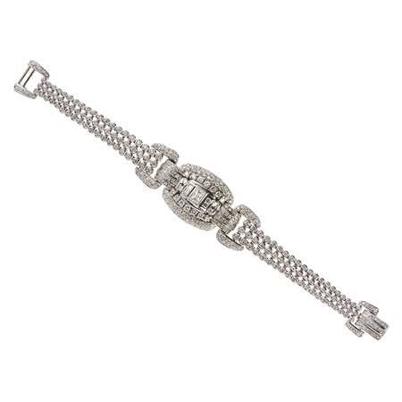 Bracciale in oro bianco 18kt e diamanti Maglia a tre fili con motivo centrale...