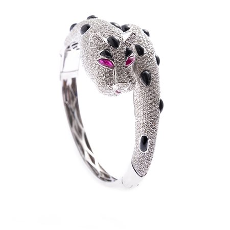 Bracciale pantera in oro bianco 18kt Con inserti in onice nera, rubini taglio...
