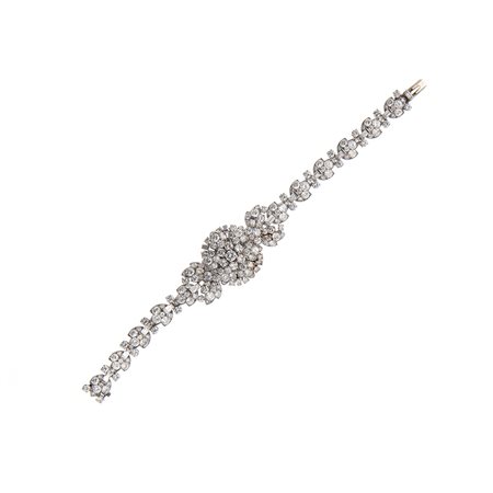 Bracciale-orologio in oro bianco 18kt, 1950 circa Bracciale e copricassa...