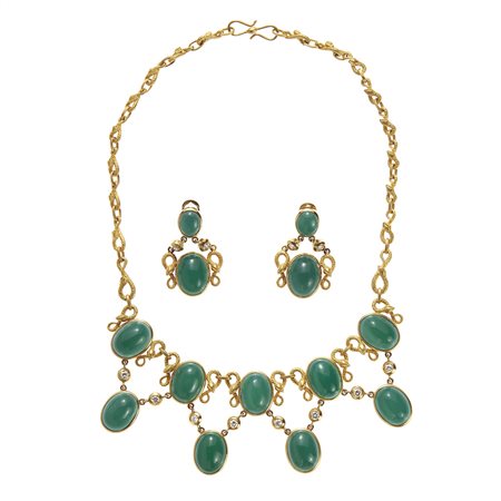 Demi parure in oro giallo 18kt Composta da collana e coppia di orecchini,...