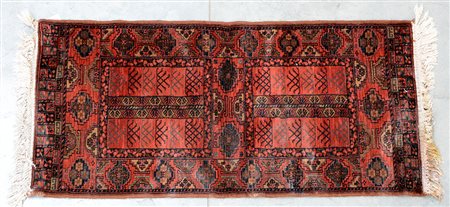 Tappeto meccanico, decoro geometrico su fondo arancio(cm 136x64) (difetti)