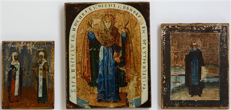 Lotto composto da tre icone su tavola. Secolo XIX (misure diverse, difetti e...