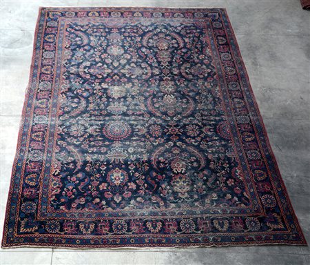 Tappeto Sarouk, Persia secolo XX. Disegno all over con foglie e rami fioriti...