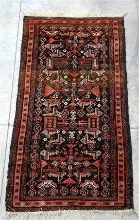 Tappeto Beluchistan, Persia inizio secolo XX. Decoro geometrico stilizzato...