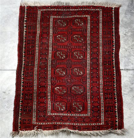 Tappeto Afghan, Turkestan occidentale, inizio XX secolo. Decoro Gul su fondo...