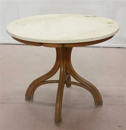 Tavolo tondo a quattro cassetti sottopiano in faggio curvato al vapore....