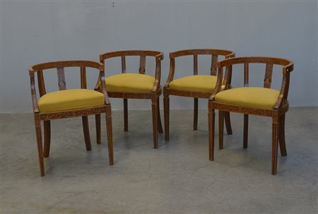 Gruppo di quattro poltroncine a pozzetto interamente decorate a motivi...