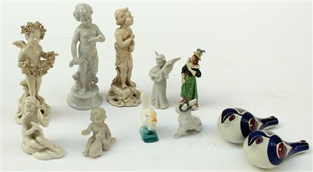 Lotto composto da undici sculturine in ceramica e porcellana (difetti)