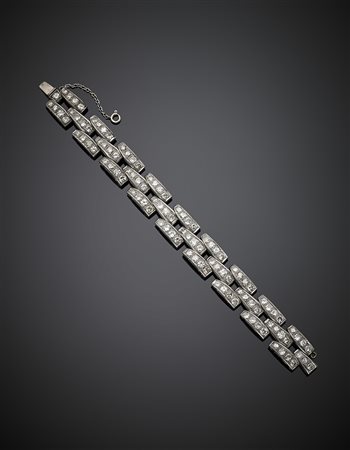 Bracciale modulare in oro bianco e diamanti per complessivi ct. 12,50 circa,...