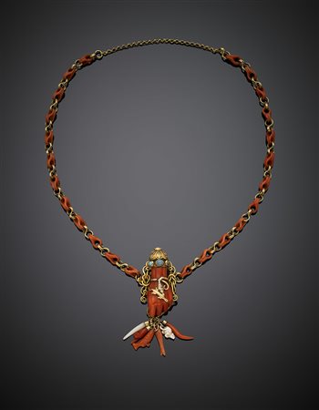 Collier in oro giallo e corallo con centrale scolpito a guisa di mano...