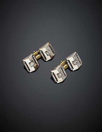 Gemelli in oro bianco e giallo rifiniti con diamanti per complessivi ct. 0,40...