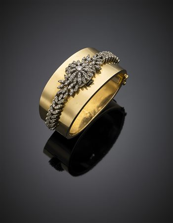 HAMILTONOrologio gioiello a scomparsa su bracciale rigido sagomato in oro...