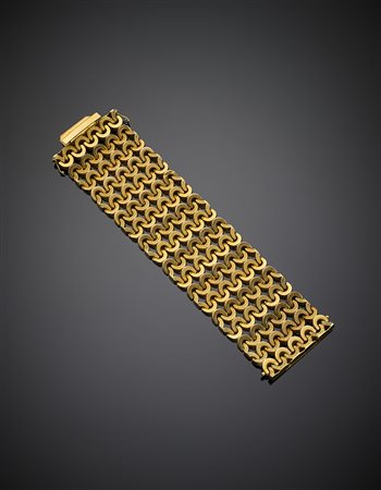 Bracciale modulare, in oro giallo in parte cesellato con due maglie di...