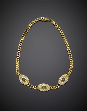 Collier in oro giallo a maglia groumette rifinito da tre ovali con diamanti a...