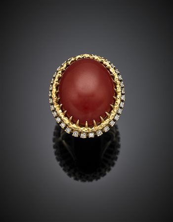 Anello in oro giallo con diamanti per complessivi ct. 0,5 circa a contornare...