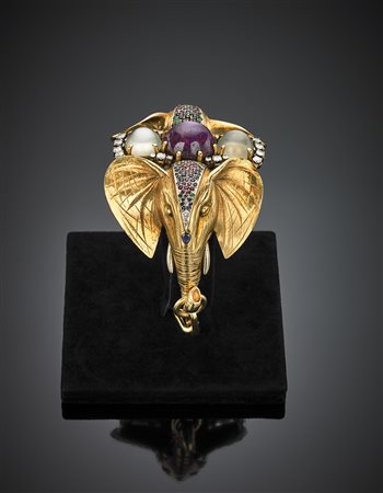 SERAFINIBracciale semirigido, apribile in oro giallo in parte cesellato a...