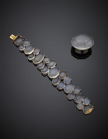 Demi-parure in oro giallo e opali ovali cabochon composta da bracciale lungh....