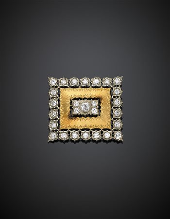 BUCCELLATISpilla rettangolare in oro giallo e bianco con diamanti rotondi per...