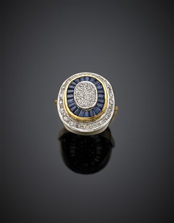 Anello in oro giallo e bianco con pavè di diamanti per complessivi ct. 0,40...