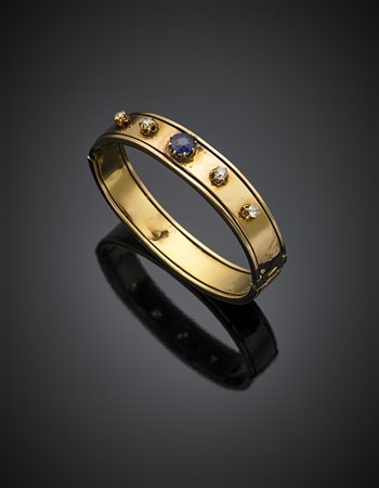 Bracciale rigido in oro giallo con zaffiro di ct. 1,54 circa e diamanti per...