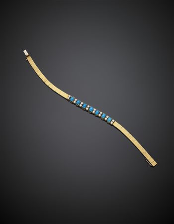 Bracciale modulare in oro giallo con turchesi e diamanti per complessivi ct....