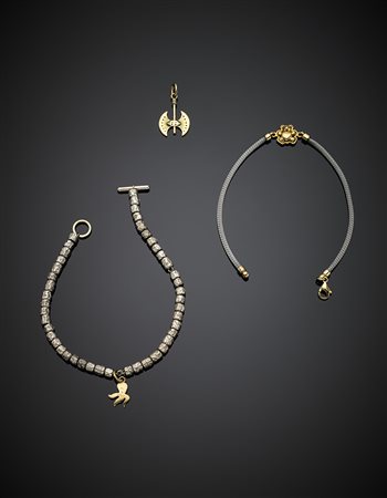 Due bracciali di cui uno DODO in argento, acciaio e oro giallo lungh. cm...