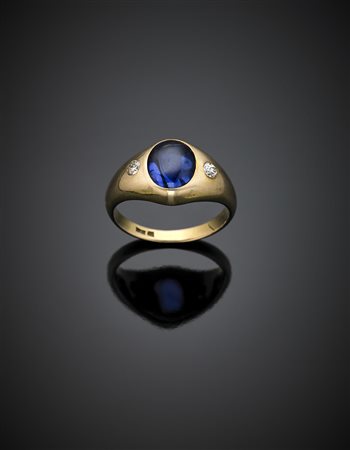 Anello in oro giallo e bianco con zaffiro ovale cabochon di ct. 3,30 circa e...