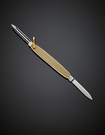 Coltellino da tasca in oro giallo rigato, lordi g 26,96, lungh. cm 7,5...