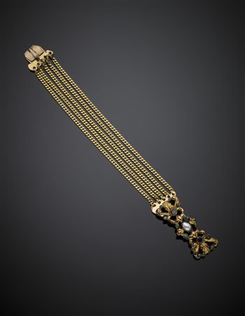 Bracciale in oro giallo a cinque fili di catene groumette con chiusura in oro...