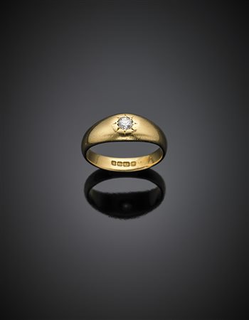 Anello in oro giallo con diamante di ct. 0,20 circa, g 7,14 misura 16,56....