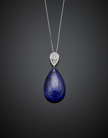 Pendente in oro bianco, tanzanite a goccia e diamanti per complessivi ct....